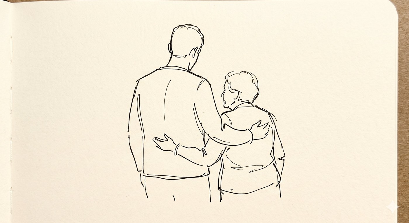 Adult with arm around an older parent
